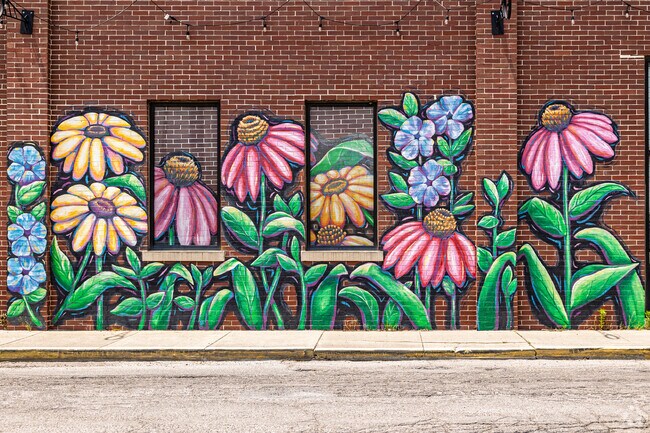 A colorful mural greets visitors to downtown Gaston.