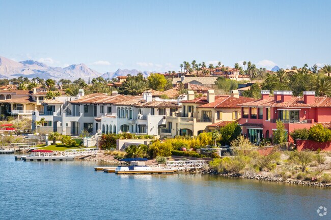 Many waterfront homes in Lake Las Vegas are designed to use the lake as their backyard.