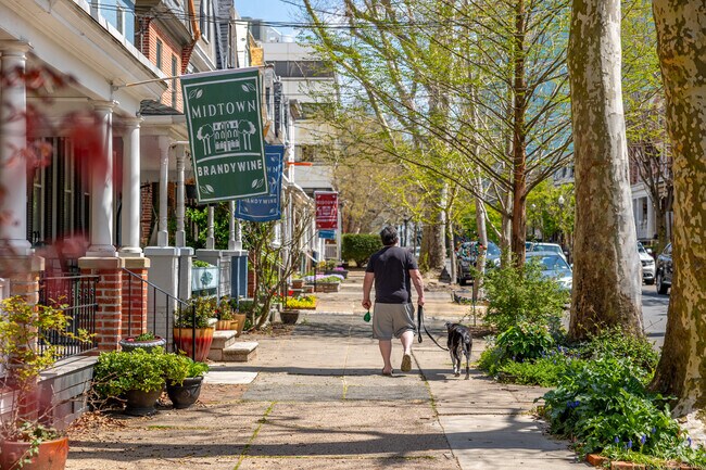 Walk along historic row homes on tree lined sidewalks to dining in Midtown Brandywine.