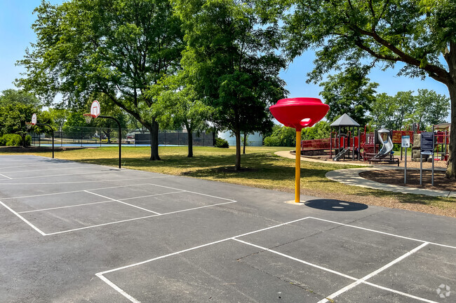 Outdoor activities and basketball hoops located at the school's grounds.