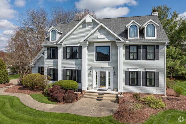 Large Colonial Revival homes stand out in High Hampton.
