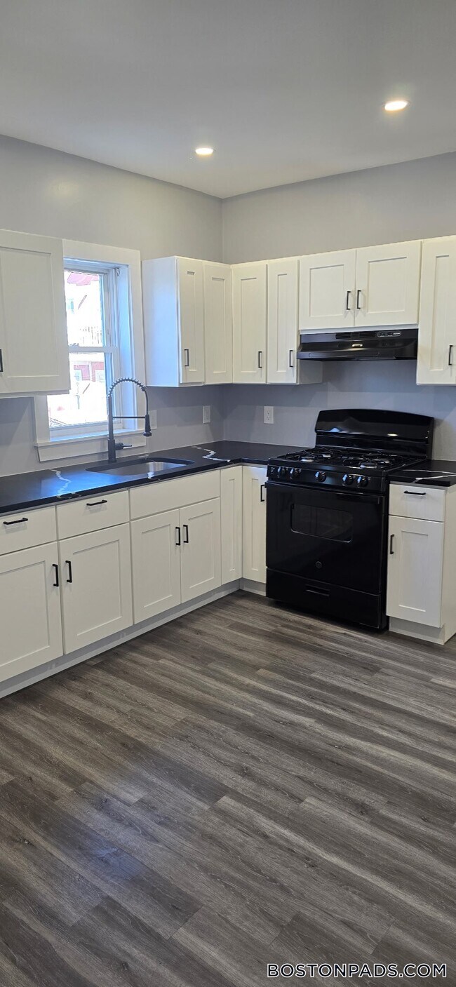 56 Woolson St Unit 1, Boston, MA 02126