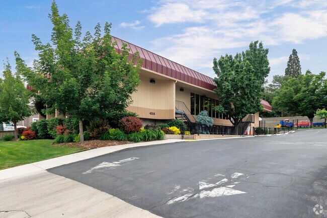 Brightly colored trees and bushes surround Challenger School’s  Holladay location.