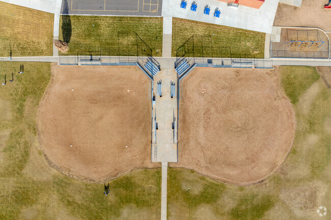 Foster Dual Language Pk-8 has two large baseball diamonds.