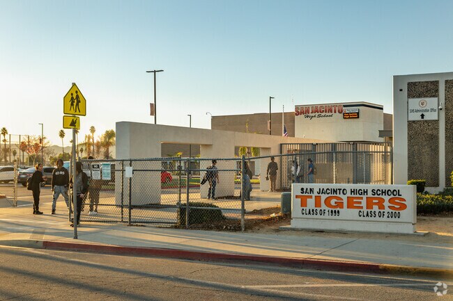 Students wait to be picked up after school at San Jacinto High School.