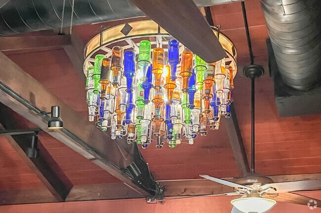 Upcycled bottles make up this unique chandelier at El Rancho Inn.
