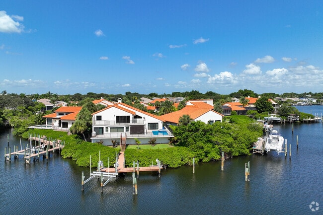 Mediterranean-style homes are frequent in Jonathan's Landing community.