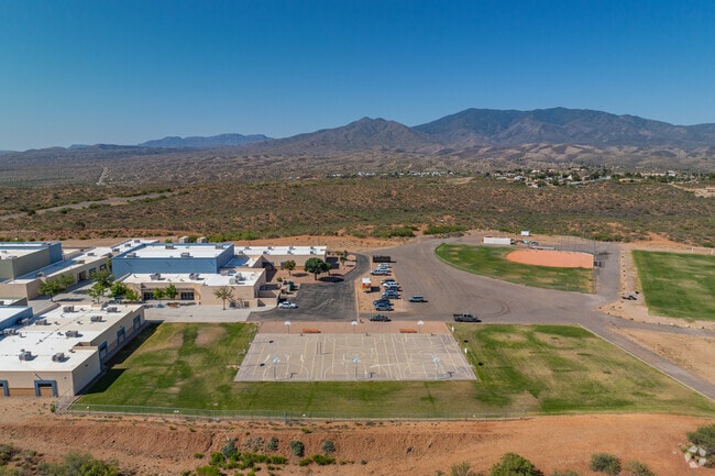 Situated at the edge of town, the campus includes athletic fields and open space that support both academics and extracurriculars.