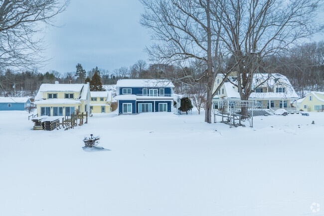 Different-sized homes line the western shore of Chautauqua Lake in North Harmony.