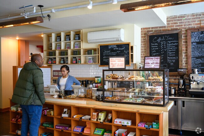 Discover Newburgh's hidden gem: Betty's Snack Bar, where the aroma of freshly baked linzer tarts and expertly crafted cappuccinos awaits.