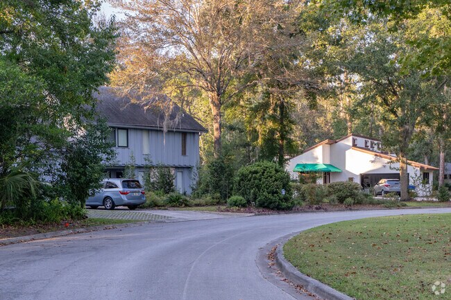The rows of houses in Suburban Heights are characterized by beautiful landscaping.