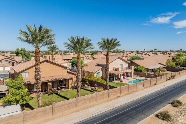 Mediterranean style homes with Palm Trees decorate the streets in Sierra Sunset.