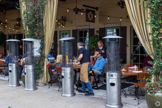 Diners in Old Naples often enjoy their meals on outdoor patios and porches.