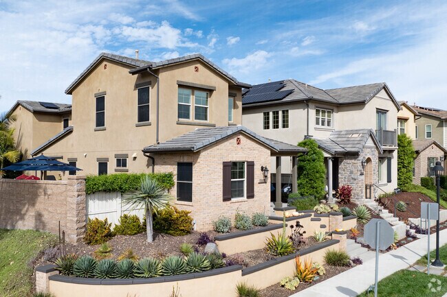 Harmony Grove homes feature manicured lawns and clean, inviting sidewalks.