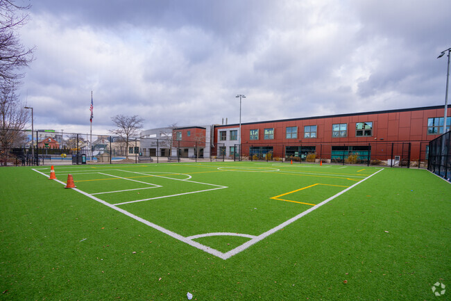 There's a small turf field outside of East Somerville Community School.