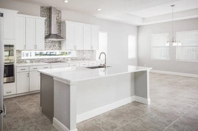 10027 Gobat Aly, Orlando, FL 32827 - photo 2