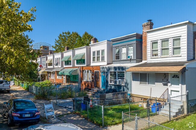 Paschall row homes often feature a small front yard, perfect for a garden.
