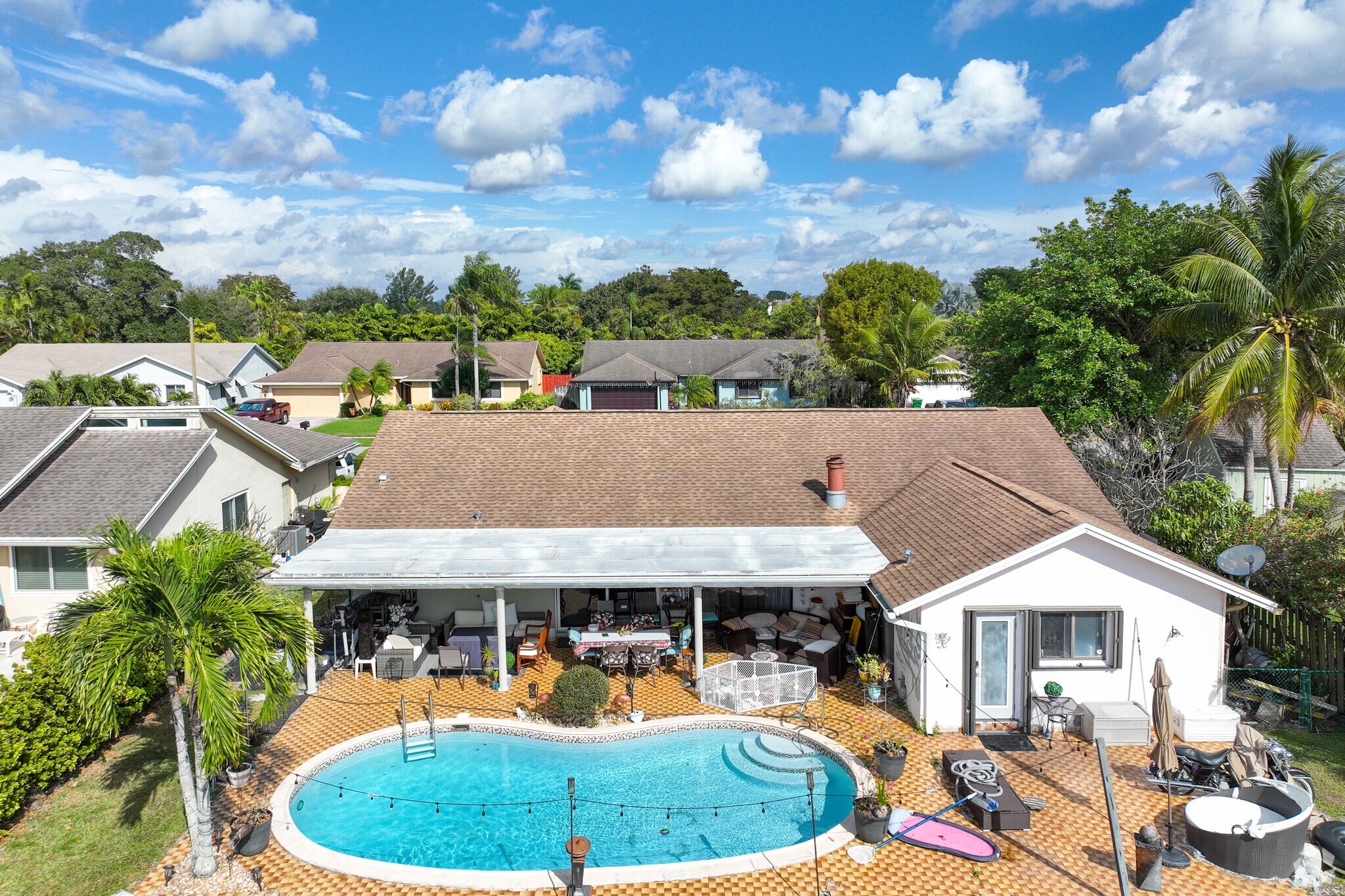 Many houses in Arrowhead feature a backyard patio and pool.