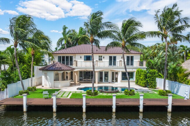 Venice Isles' waterfront mansions, offering breathtaking views and luxury living.