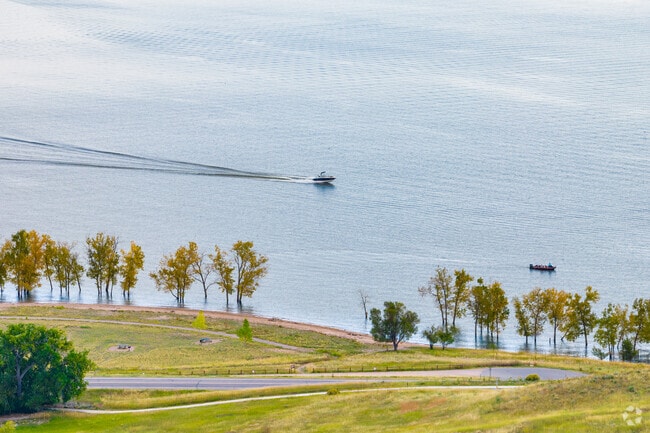 Go boating, swimming, or biking around Chatfield State Park near Foothill Green.