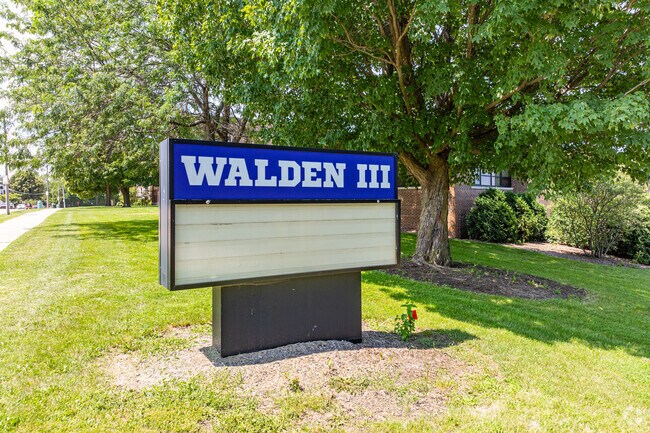Large mature trees surround Walden III School in Racine's Kinzie Heights.