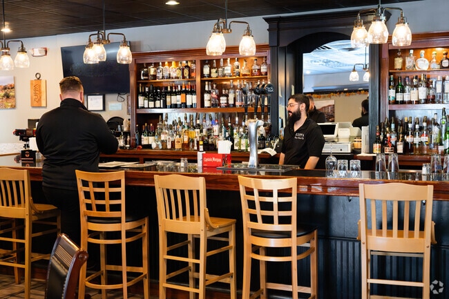A fully stocked bar greets patrons of Zuppa Unique Italian Pub in Wolcott.