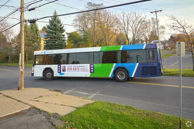 A Centro Transit Service bus enters SUNY Oswego.