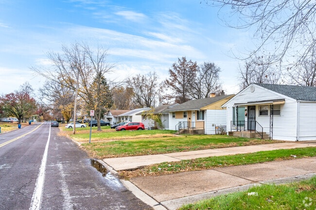 Many homes in Glasgow Village have covered entries and larger roof overhangs.