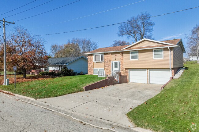 Bi-level and ranch-style homes appear throughout Postville.