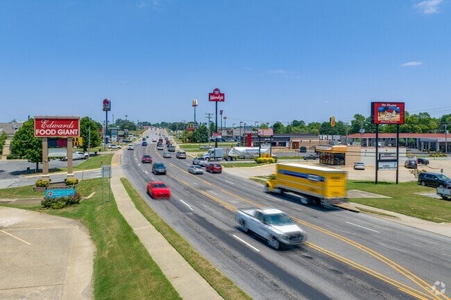 Reynolds Road cuts through the heart of Bryant, Arkansas with many restaurants and businesses.