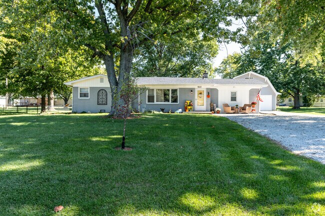 Camby, IN has ranch homes with large lots and lush tress for shade all just South of Indy.
