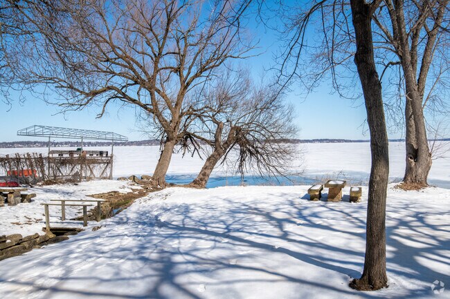 Merrill Springs Park has a view in distance of lake.