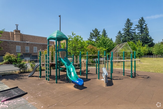 The play structure behind the Cesar Chavez K-8 School.