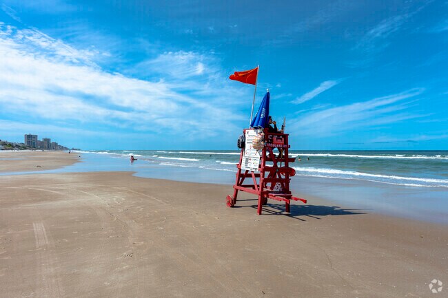 Swim safely near a lifeguard in Ponce Inlet.