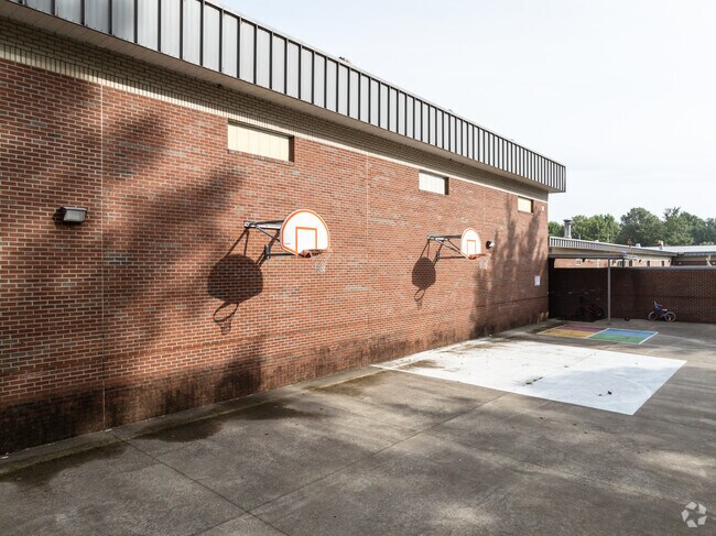 There's a small basketball court at Lyle Creek Elementary School.