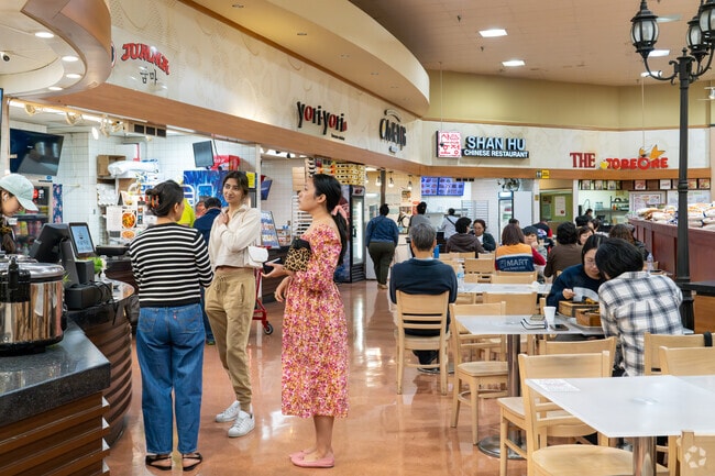 Spring Branch Central locals savor authentic cuisines at H Mart's food court.