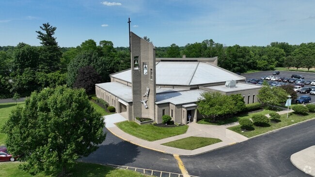 Aerial view of the campus church adjacent to the school building.