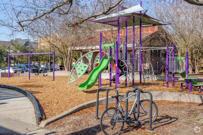 Martin Park in East Central, Charleston, offers a shaded playground where children can play comfortably.