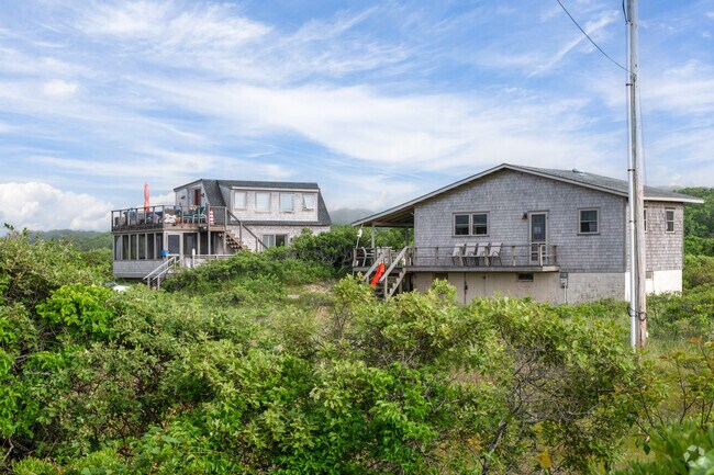 A row of beach cottages sits along Lobsterville Rd in Aquinnah.
