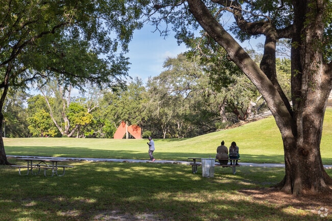 Relax under beautiful oak trees at Greynolds Park.