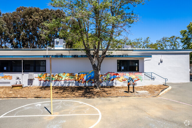 Highland Elementary has a colorful mural near its basketball courts.