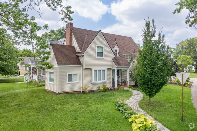 A Cape Cod home in North Linden features a well-manicured front yard.