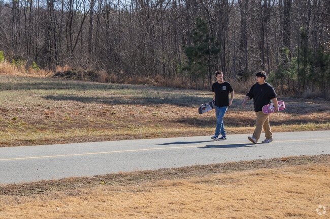 Friends from Graham relish a sunny afternoon at Regional Park.