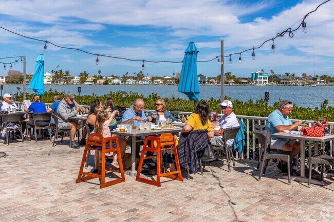 Enjoy the waterfront views during your meal at Seabreeze Island Grill & Bar.