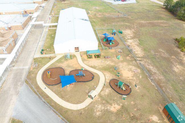 Kids play on the playground at Clanton Intermediate School.