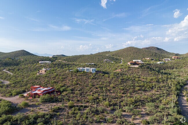Numerous rural homes sit in the hills of Westside Development.