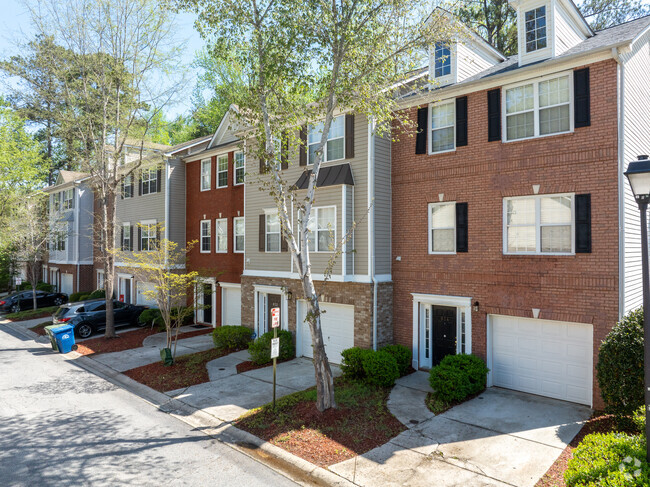 A row of beautiful townhomes in the gates community of Villages of Cascades in the Mays neighborhood.