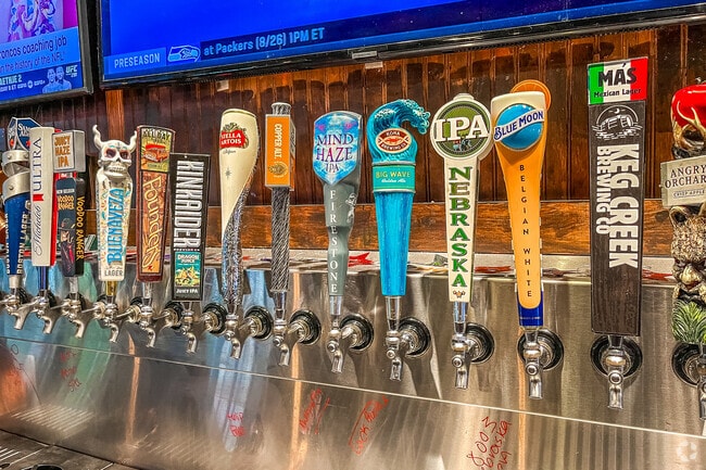 Locals flock to Old Chicago for their huge selection of local craft beers in Harvey Oaks.