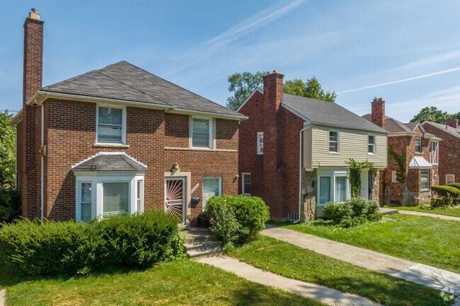Grandmont's colonials often feature bay windows with brick or siding.