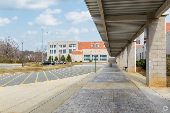 Stuart W. Cramer High School student drop off and bus area.